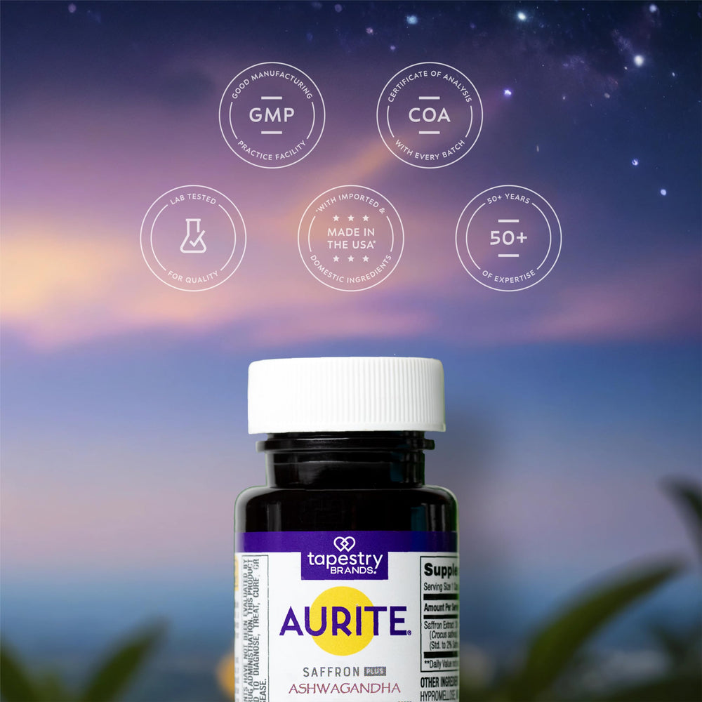Two Aurite saffron capsules with water, for a simple daily ritual.