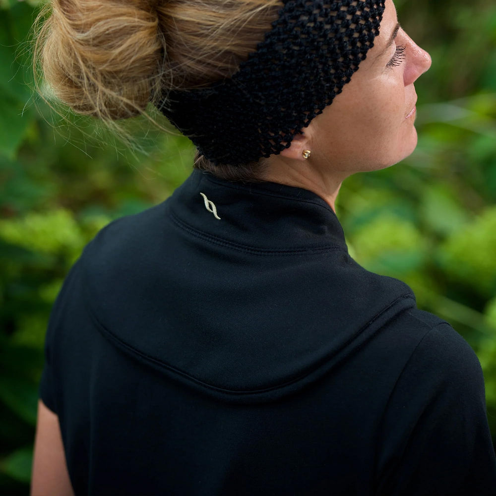 Back on Track neck brace in use demonstrates secure fit and gentle warmth.