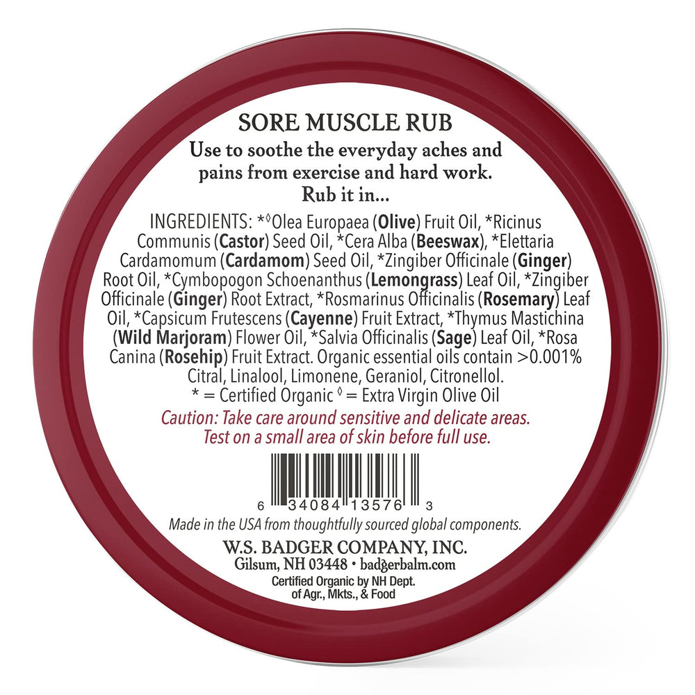 Hands applying Badger Sore Muscle Rub showing massage-friendly texture.