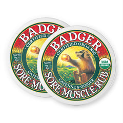 Badger Sore Muscle Rub tin front view, compact warming balm for post-activity relief.