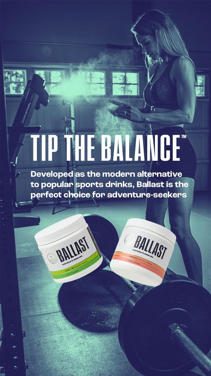 Ballast grapefruit drink being stirred in a tumbler after a run.
