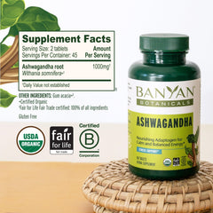 Banyan Botanicals Ashwagandha serving with water for daily energy support.