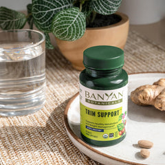 Banyan Botanicals Gotu Kola Ginger and Black Pepper imagery signaling warming vitality.