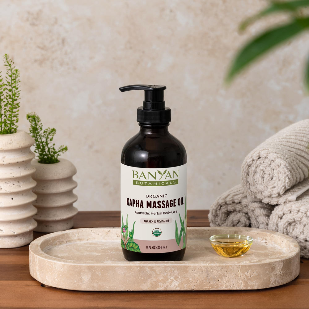 Banyan Botanicals Kapha Oil in winter warmth, ideal for comforting self-massage.