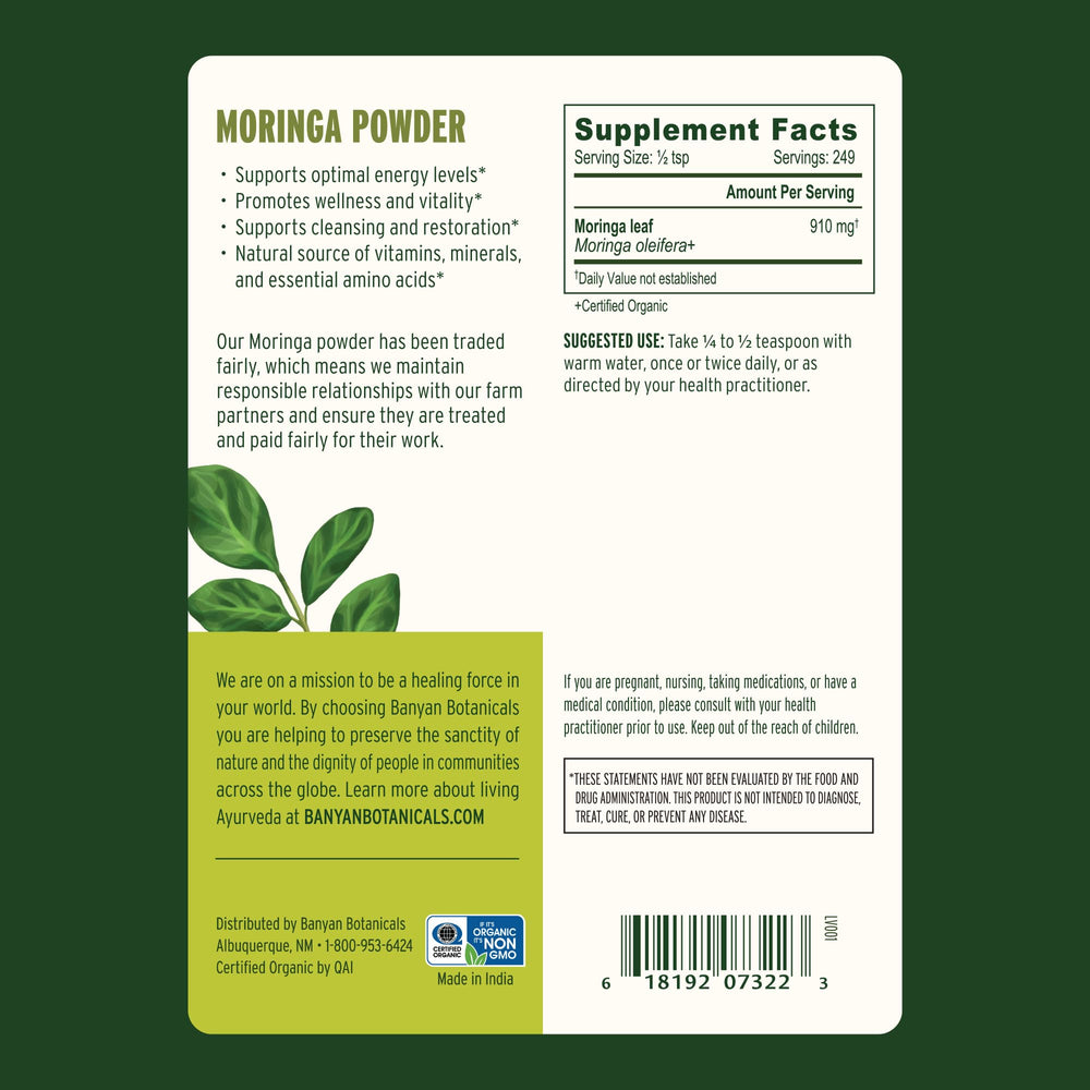 Banyan Botanicals Moringa leaf close-up showing rich green powder.