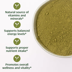 Banyan Botanicals Moringa powder pouring into a cup.
