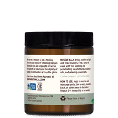 Banyan Botanicals Muscle Balm with ashwagandha root detail highlighting herbal infusion for calming relief