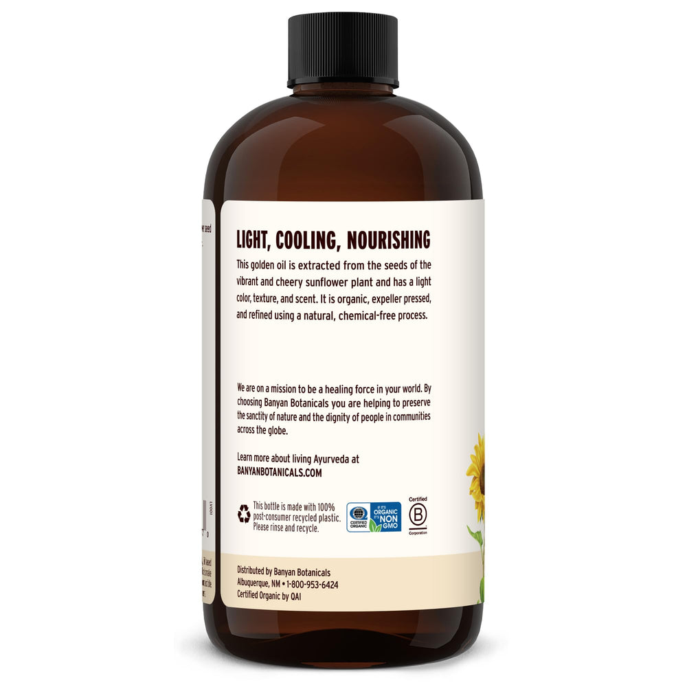 Application scene shows moisturizing hands using Banyan Botanicals Sunflower Oil for daily care.