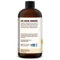 Application scene shows moisturizing hands using Banyan Botanicals Sunflower Oil for daily care.