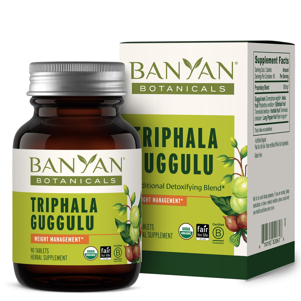 Banyan Botanicals Triphala Guggulu bottle on counter suggesting digestive support