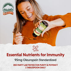 Barlean's Olive Leaf Complex amber liquid supports daily wellness in routine.