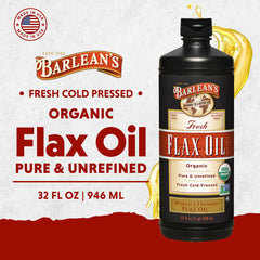 Barlean's flaxseed oil in a glass bottle on wood surface for versatile vegan nutrition