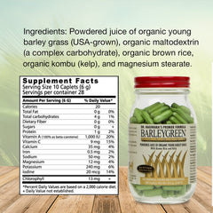 BARLEYGREEN Caplets arranged with green leaves, emphasizing natural, plant-based wellness.