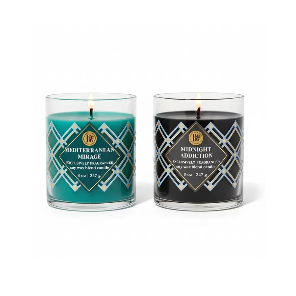 Bath & Body Works Midnight Addiction candle 8oz with warm glow and inviting aroma.