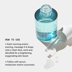 Beauty Pie Superdrops being massaged onto face for a brightening boost.
