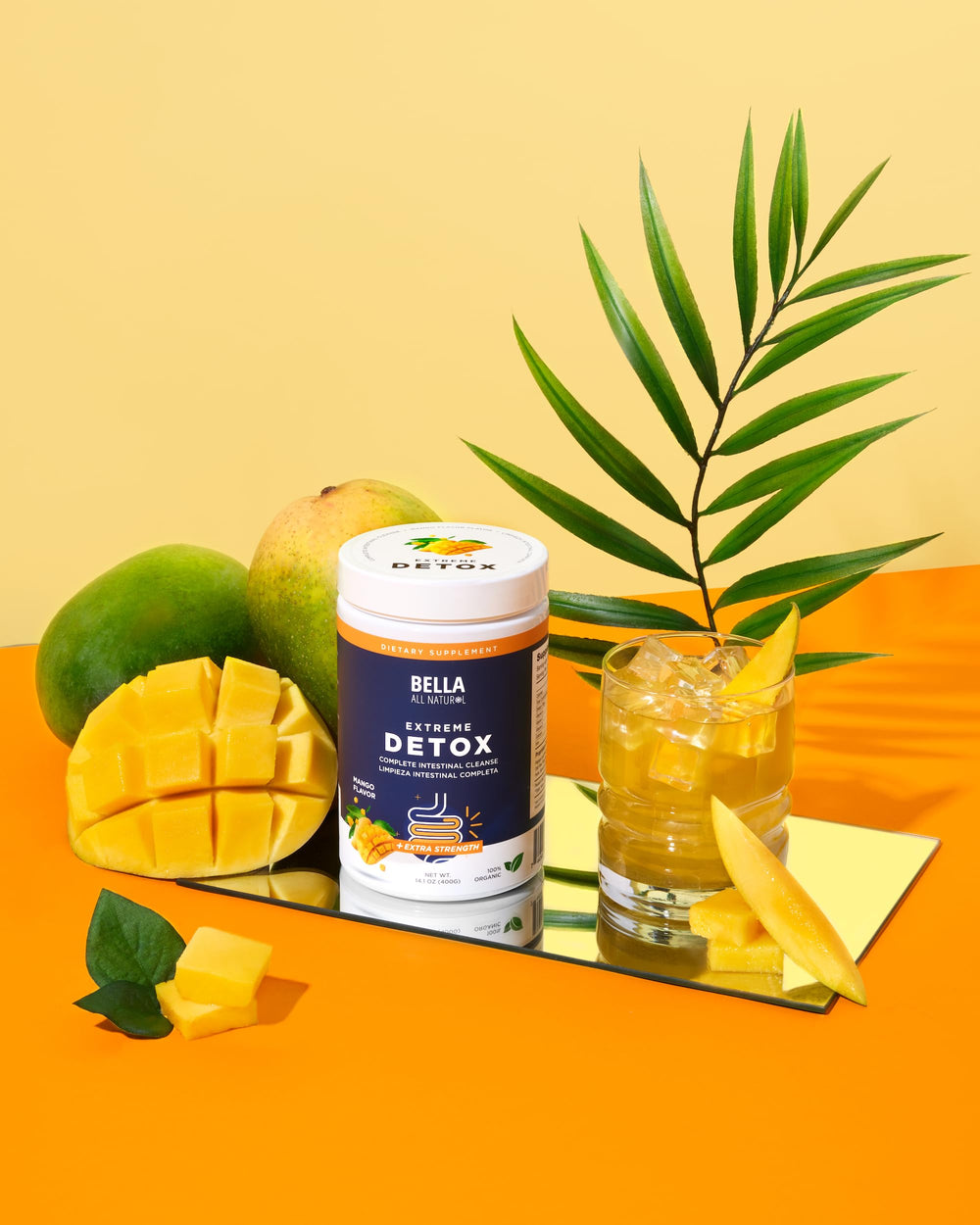 Bella All Natural Detox Powder Mango mixing bottle for a refreshing drink