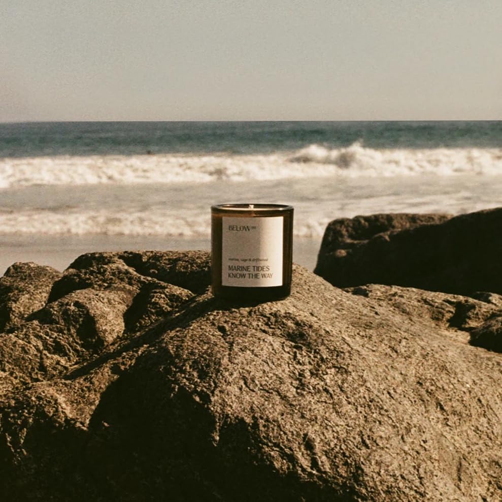 Below 60 candle close-up sage grapefruit notes evoke fresh morning brightness.
