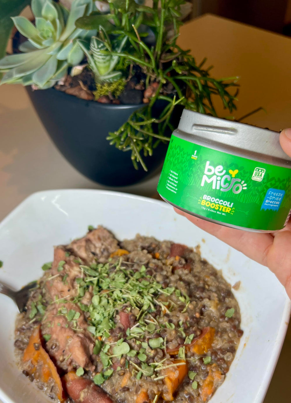 BeMicro tin and spoon, depicting convenient, ready-to-use nutrition.