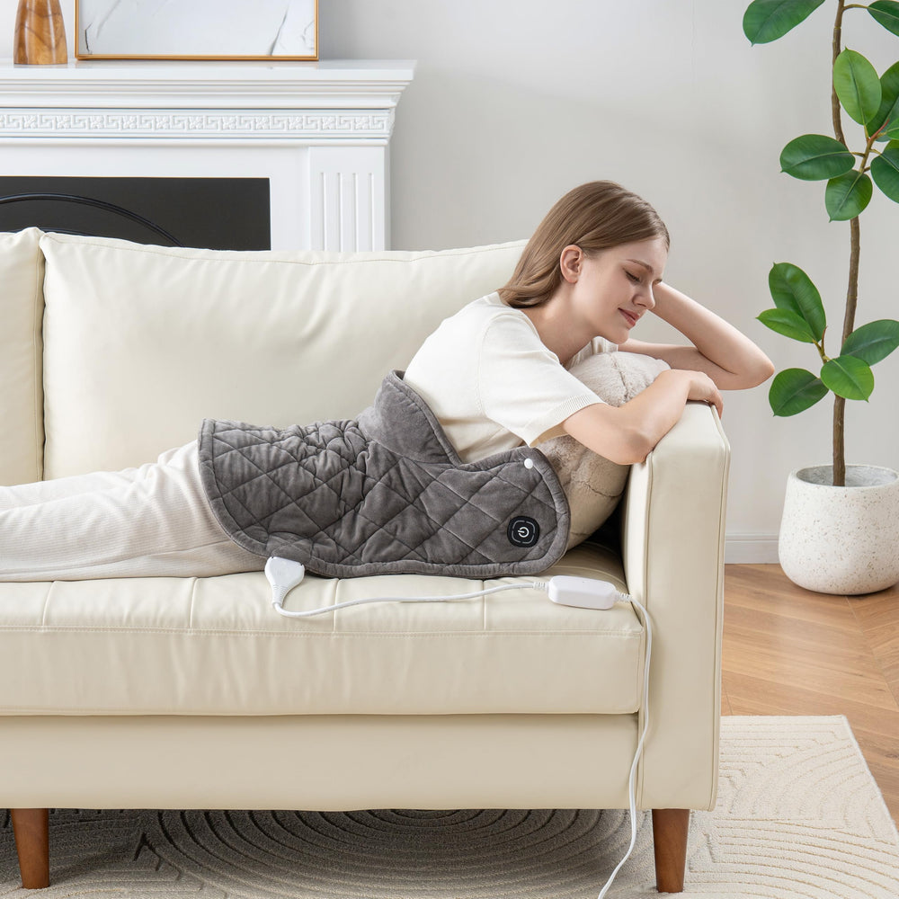 Berkshire Blanket weighted heating pad back wrap demonstrates ergonomic support.
