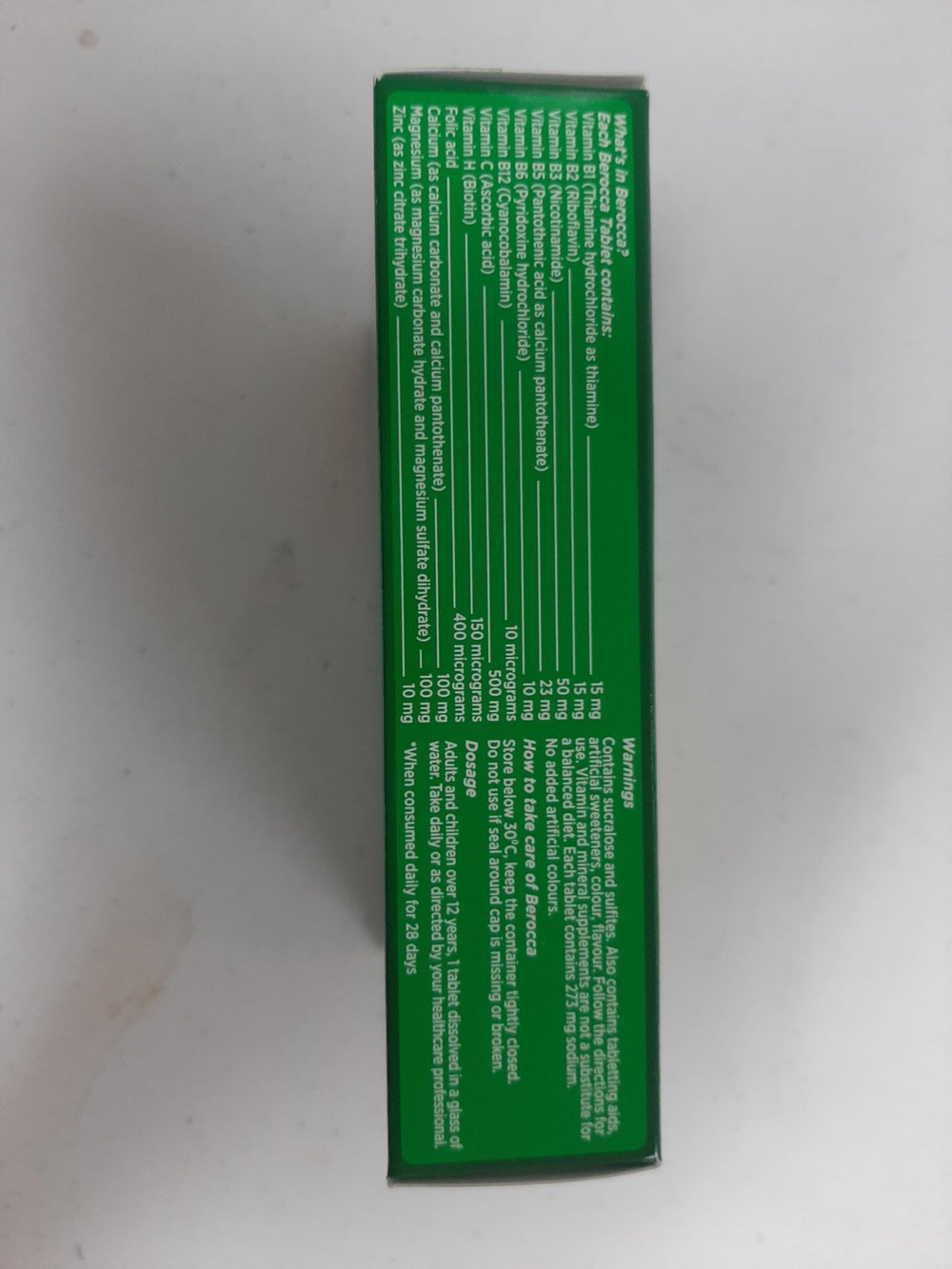 Berocca Energy tablets fizzing in a glass with a fruity aroma