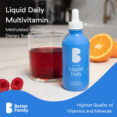 Better Family dropper dispensing liquid vitamin into glass for easy use.