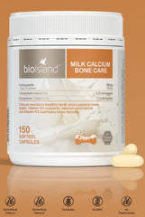 Bio Island Milk Calcium Bone Care pouring capsules into hand or cup.
