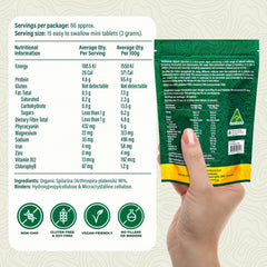 Biogenesis Spirulina mini tablets on hand for on-the-go nutrition.