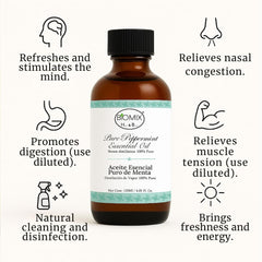 BIOMIX peppermint oil pour close-up shows controlled application for scalp and blends.