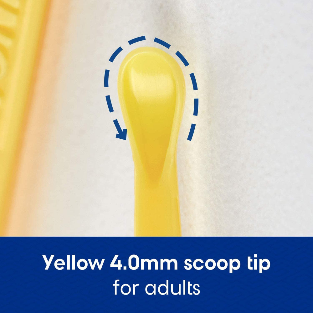 Bionix CeraSpoon yellow ear curette held for ergonomic clinic use.