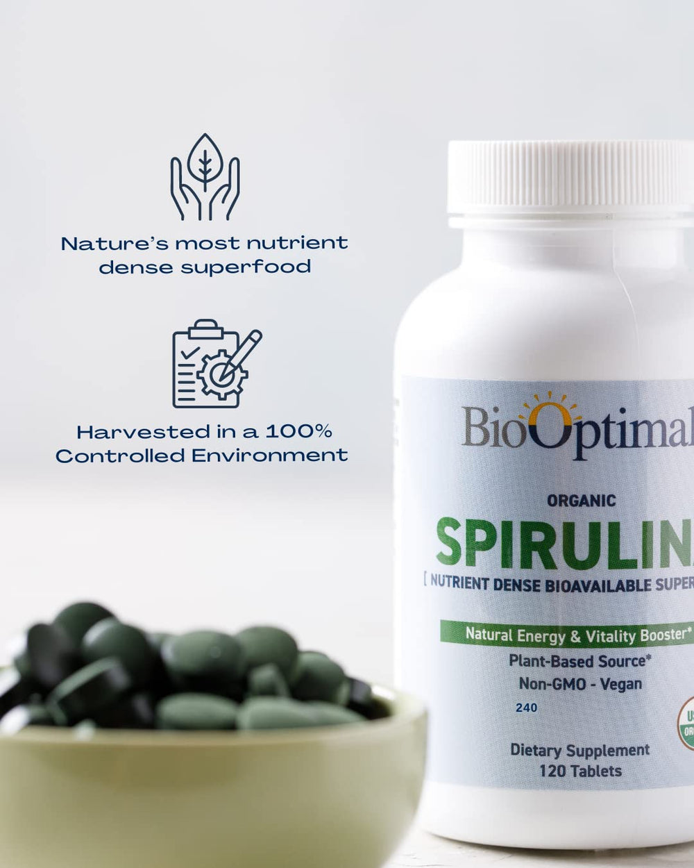 Pouring BioOptimal spirulina tablets illustrates convenient daily intake for busy routines.