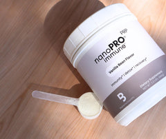 Glass with Nanopro Immune shake ready to hydrate after training.