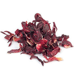 Paste made from Bixa Botanical Hibiscus Powder for scalp care with coconut milk.