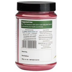 Bixa Botanical Hibiscus Powder jar close-up highlights rich color and quality.