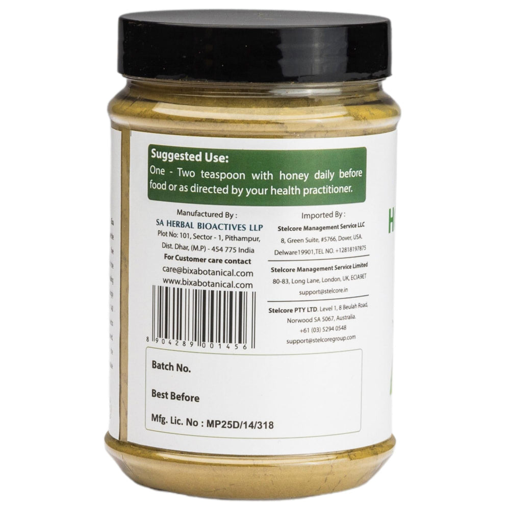 bixa botanical tulsi leaves powder tea premix closeup shows vibrant green leaves