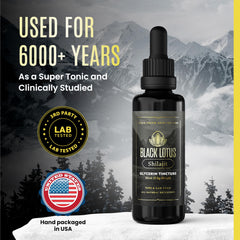 Black Lotus Shilajit bottle beside tea indicating easy daily use.