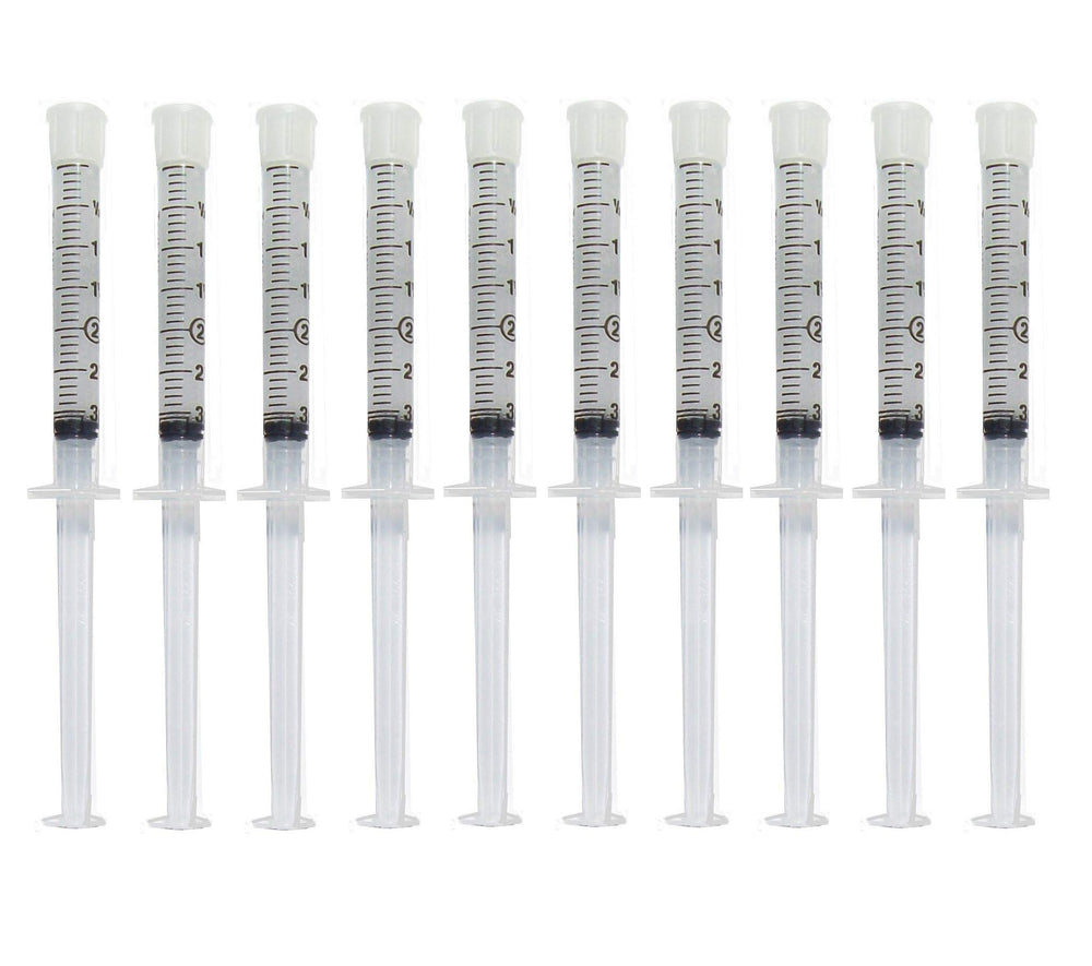 Bleach Pro Whitening gel syringe close-up showing a precise 3ml dose for application.
