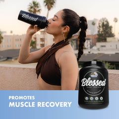 Blessed vegan protein powder shaker in use with a blend