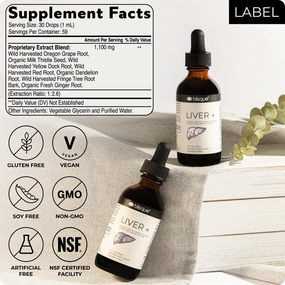 Blisque LIVER+ glass with bottle on counter, natural supplement for energy and digestion.