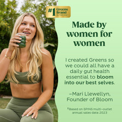 Bloom Nutrition greens powder tub with scoop for consistent daily servings.