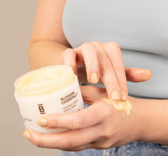 Texture of Blossom Essentials Honey Salve spread on skin for quick absorption.
