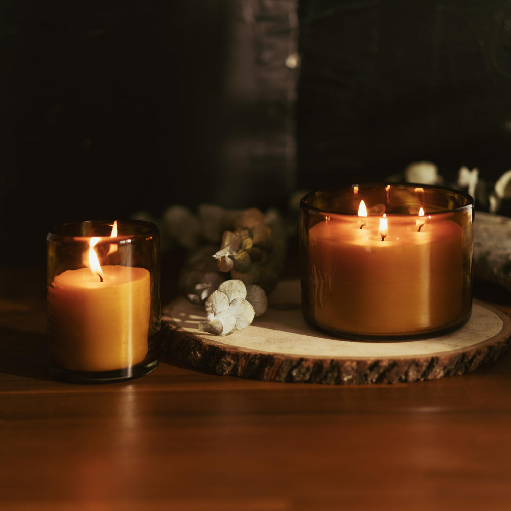 Three-wick burn time shot from Bluecorn Beeswax during a dining setting
