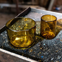 Bluecorn Beeswax amber glass vessel enhancing home decor surfaces