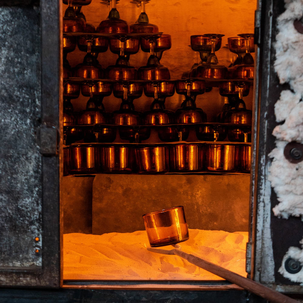 Refillable amber glass vessel for ongoing use with Bluecorn 3-wick refills.