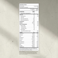 Blueprint Bryan Johnson protein powder scoop shows 26g protein per serving for plant-based nutrition.