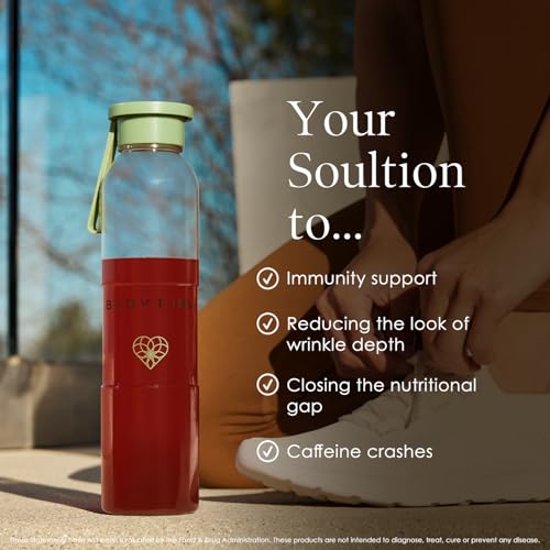 Glass of Body Firm Youthful Essence mixed drink with citrus berry flavor