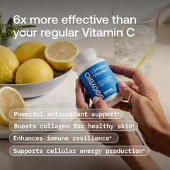 BodyBio Liposomal Vitamin C glass with capsules as part of a simple wellness routine