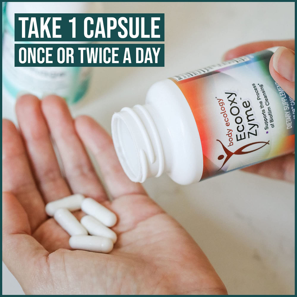 Body Ecology EcoOxyZyme capsules closeup highlighting smooth vegan capsules and enzyme blend.