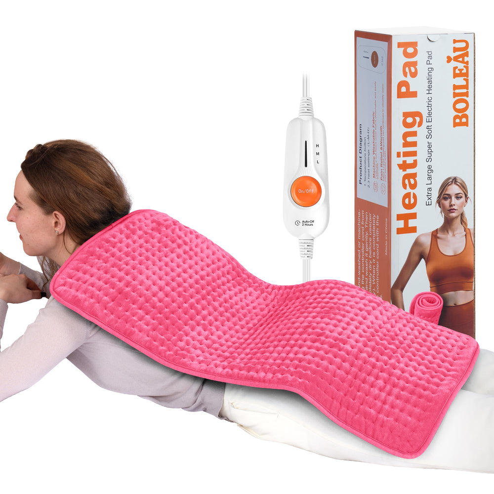 Boileau XXL heating pad on back showing wide coverage for muscle relaxation