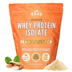 Brad grass-fed whey isolate peanut butter 2lb being poured into a glass for a smoothie