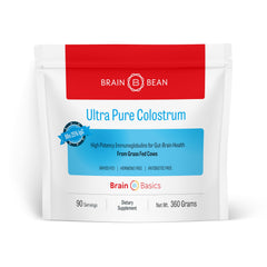 Brain Bean Colostrum powder tub close-up, a convenient daily supplement for gut and immune balance.